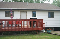 a house with trees in the background