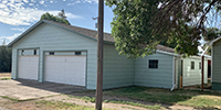 a house with trees in the background