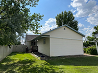 a house with trees in the background