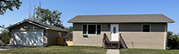 a house with trees in the background