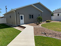 a house with trees in the background