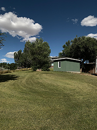 a large lawn in front of a house