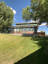 a large lawn in front of a house