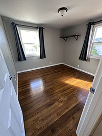 a kitchen with a wood floor