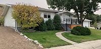 a large lawn in front of a house